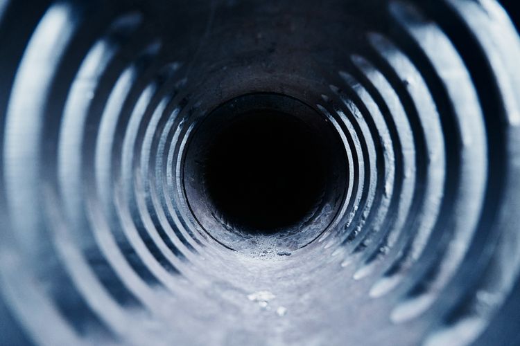 The inside of a pipe, as a drain camera sees it