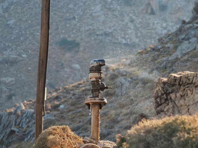 Water spraying from a broken standpipe